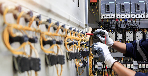 Professional Electrician technician working in Five Corners, WA